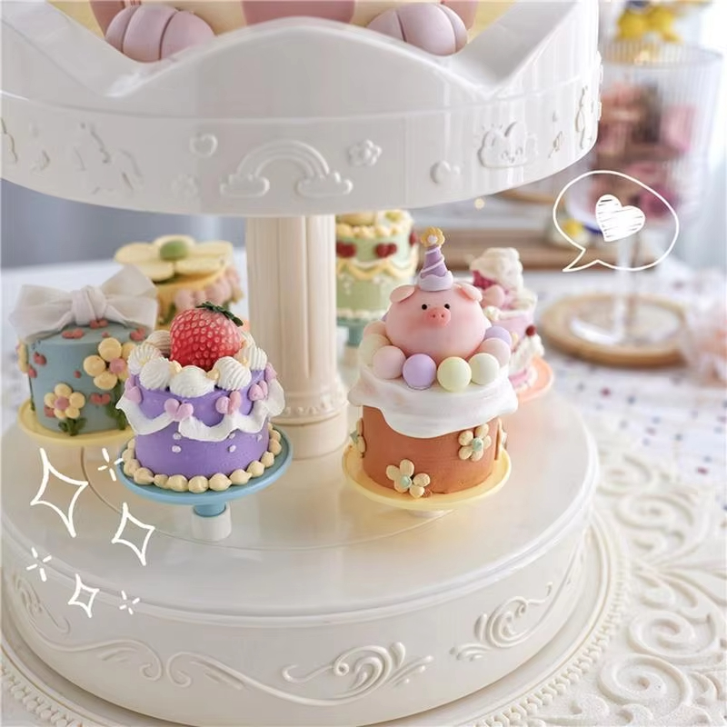 2-laags automatisch roterende  - Cupcake Stand Tier recensie en prijs
